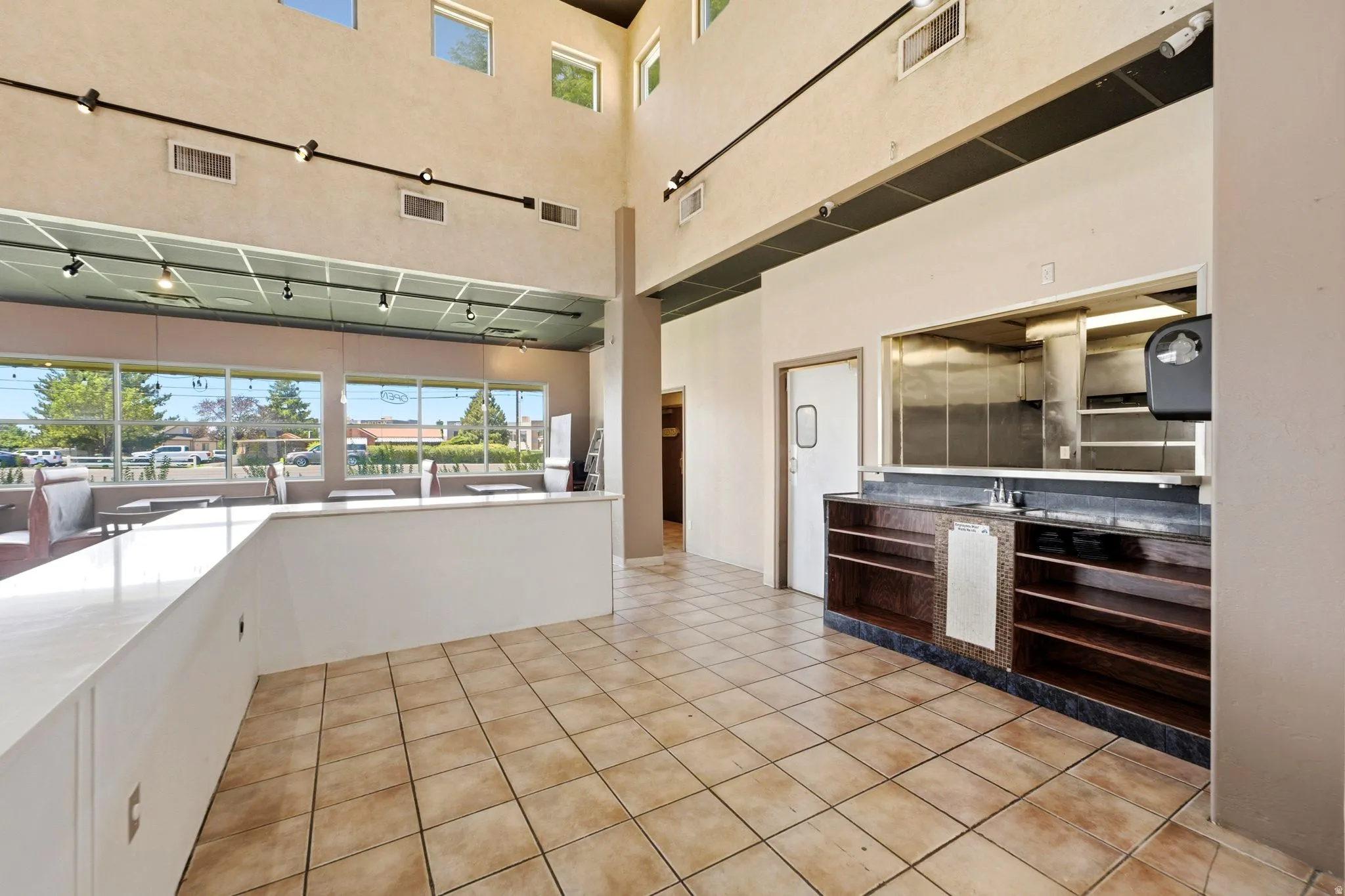 Front facing bar could serve as a sushi line with supported expo passthrough window
