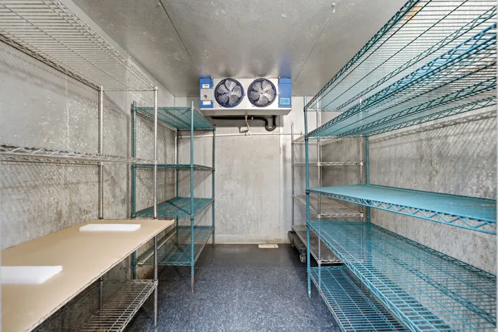 Walk-in fridge with approximately 72 sf and shelving