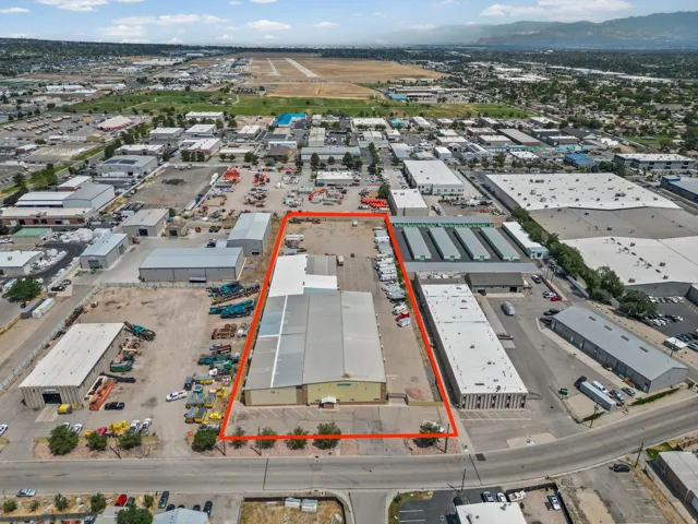 Industrial property with multiple structures and extensive paved areas