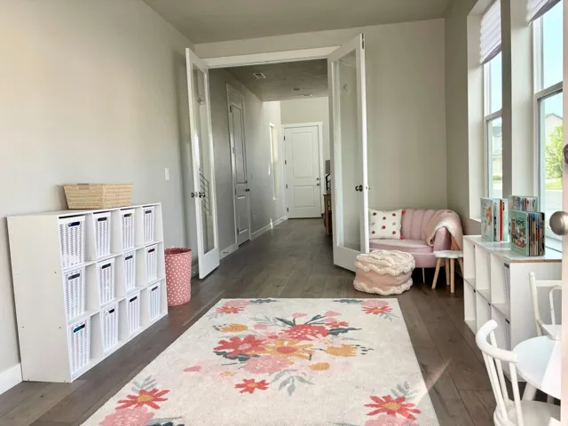 Wide plank wood-finish flooring throughout