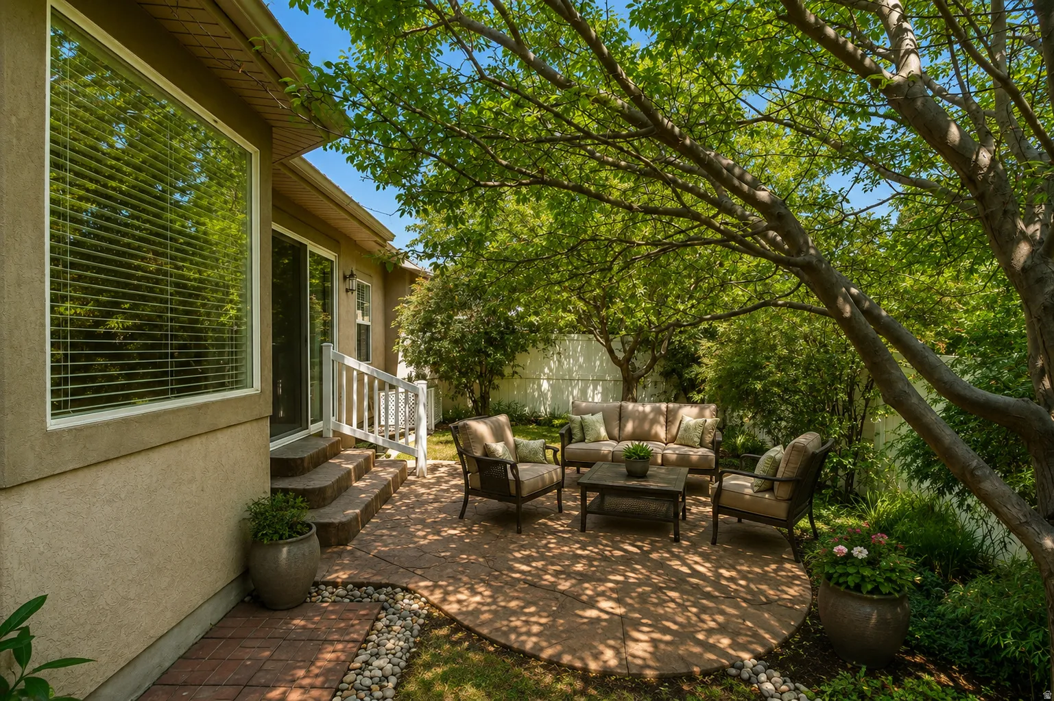 Relaxing and serene back patio with lots of shade.   Virtually staged to show possibilities.