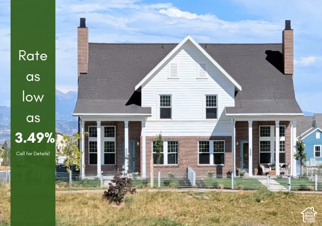 White siding and brick exterior