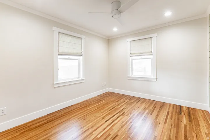 Hardwood flooring, recessed lighting, and a ceiling fan