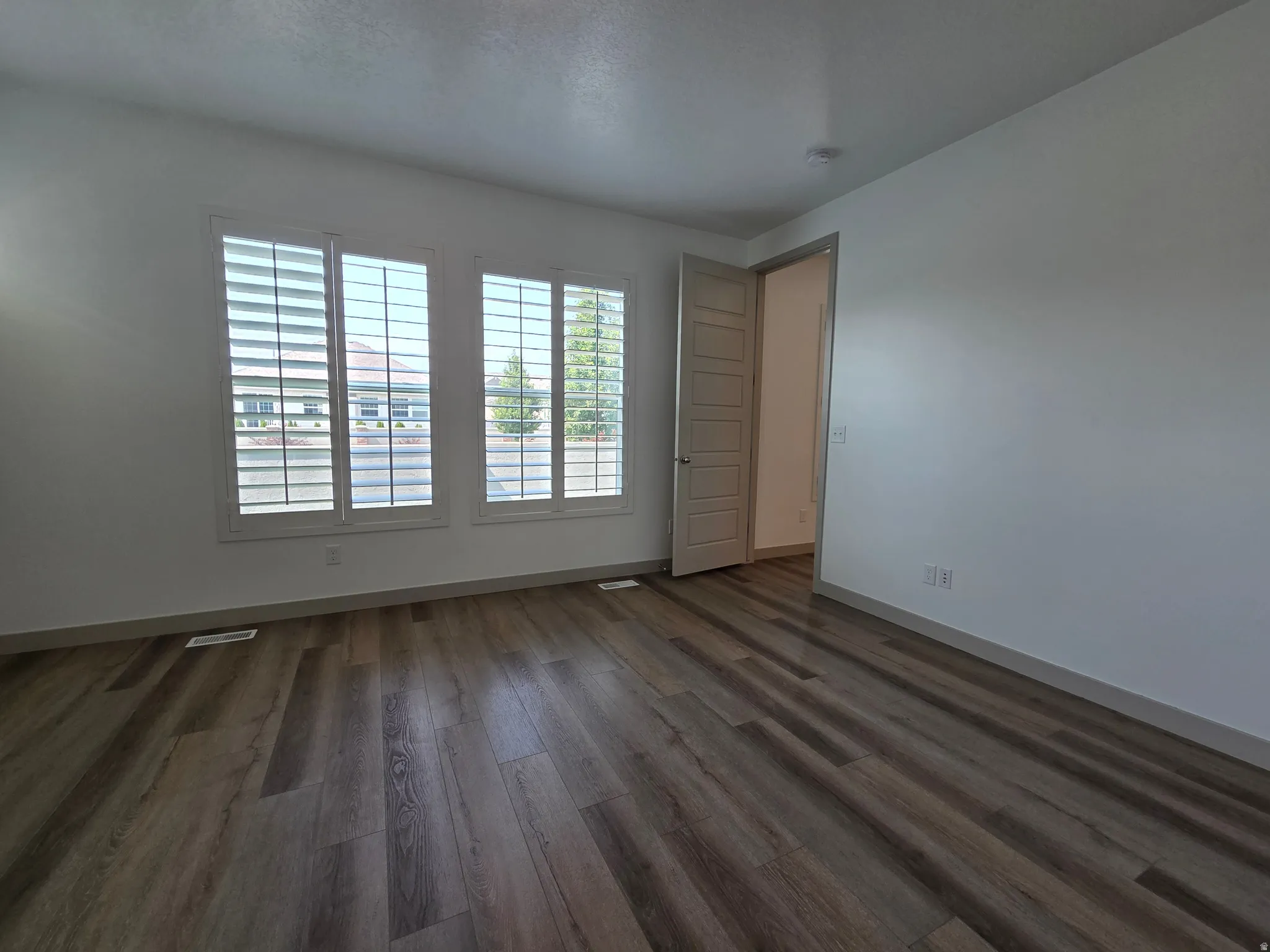 Wood-finish flooring throughout