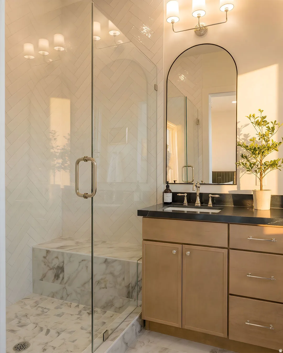Primary Bath- Glass-enclosed shower with a built-in bench