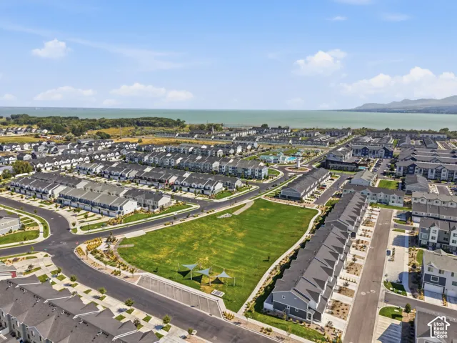 Community featuring water frontage, dedicated green spaces, and mountain backdrop
