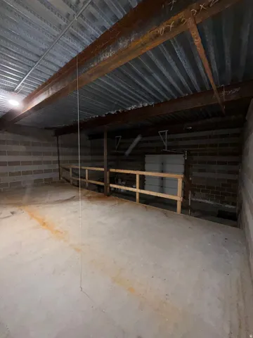 Secure flex/utility garage with overhead garage door that allows access to park side-by-sides, snowmobiles, electric bikes, mountain bikes, ect. on lower level and great storage for other recreational toys, clothes, boots, ect. on upper level before enter