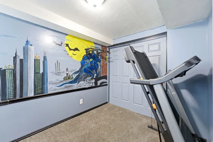 Wall mural, recessed lighting, carpeted flooring, two-panel sliding closet doors, painted walls