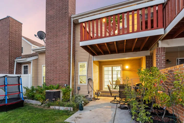 Ground-level patio with sliding glass door access