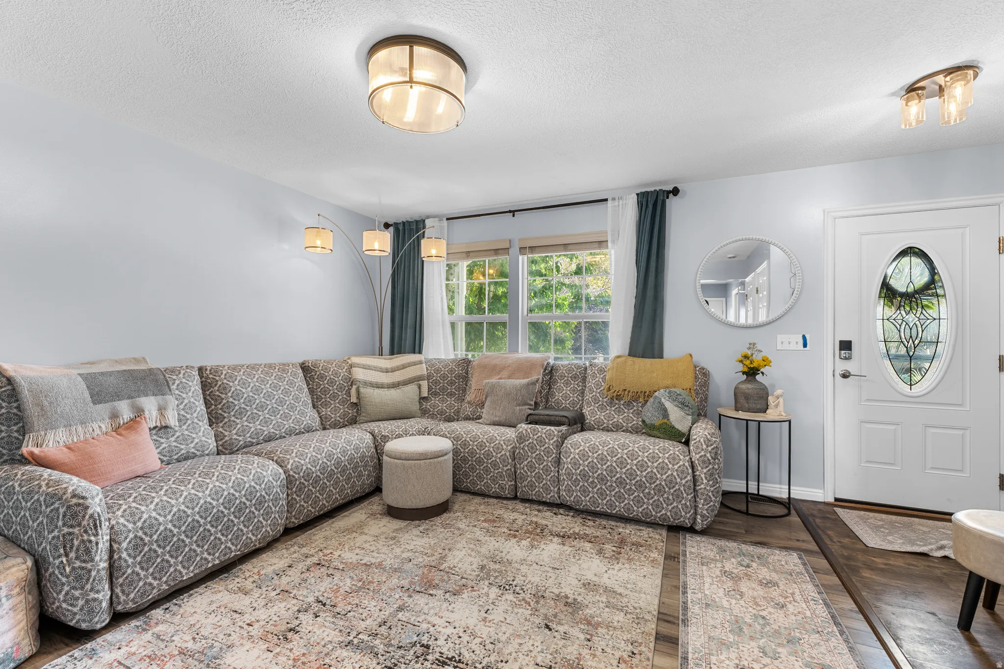 Hardwood-style flooring with area rug