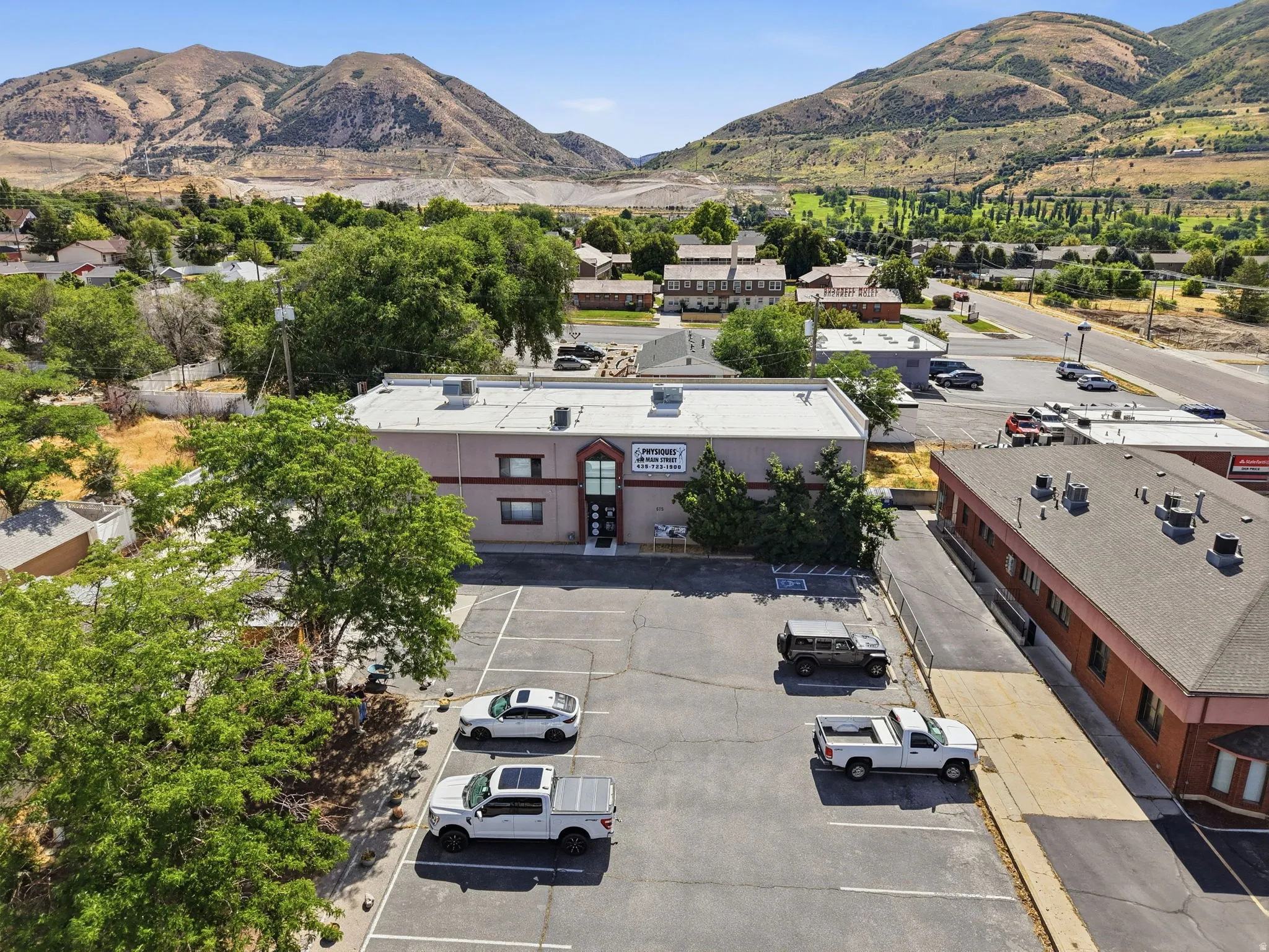 Commercial property featuring a single-story structure with a flat roof and clean architectural lines