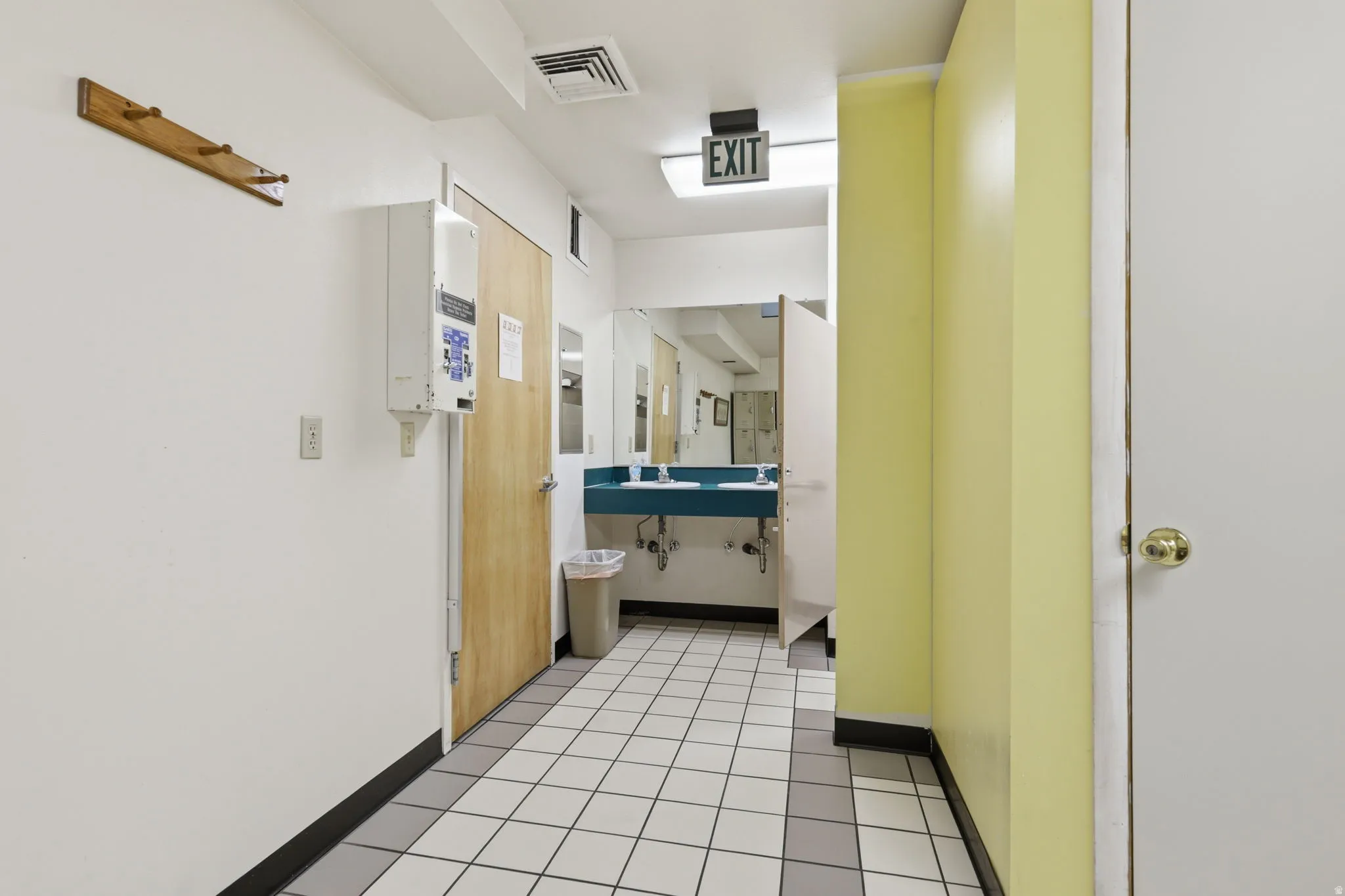 Tile flooring with contrasting gray and white squares