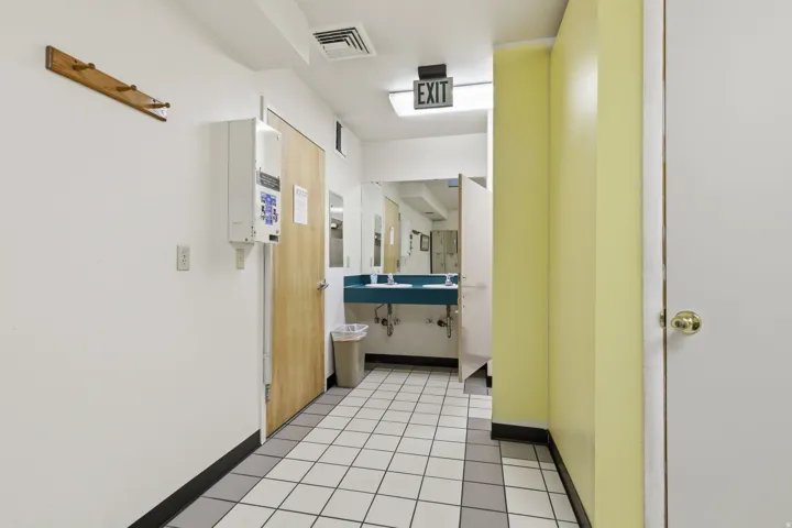 Tile flooring with contrasting gray and white squares