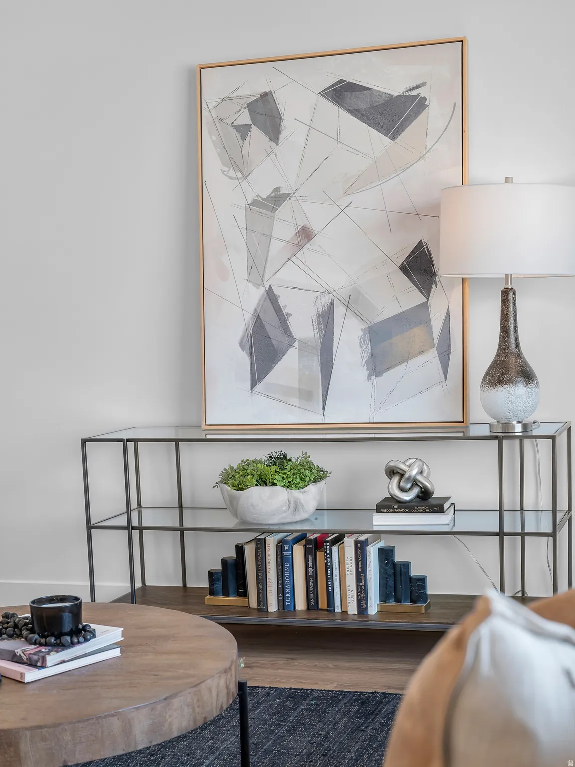 Glass-top console table with metal frame