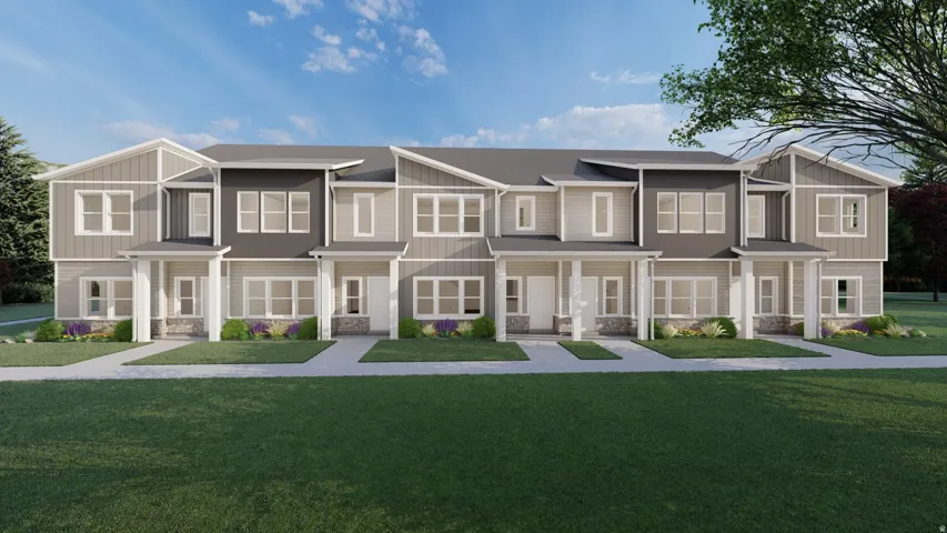 Modern townhome exterior featuring multi-toned siding, gabled rooflines, stone accents, and covered entryways