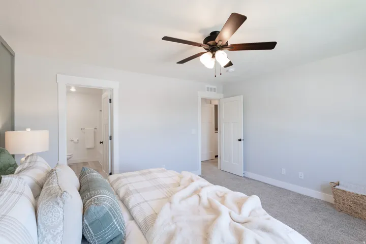 Ceiling fan with integrated lighting, recessed lighting, neutral wall palette, plush carpeting, and white trim