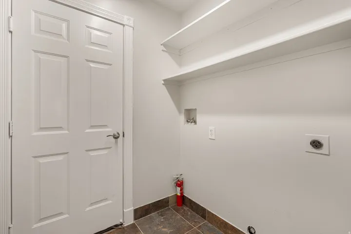 White paneled door with brushed nickel hardware