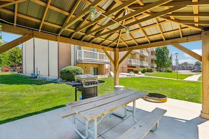Wood-frame gazebo with a corrugated metal roof