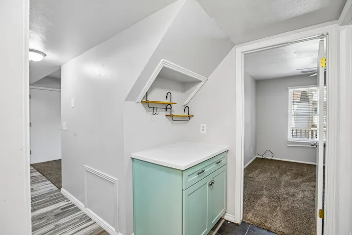 Custom built-in cabinetry with a white countertop
