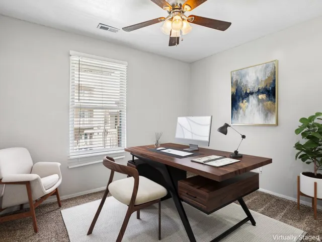 Recessed ceiling light, ceiling fan with light fixture, window with blinds, light-toned wall paint, and carpeted flooring