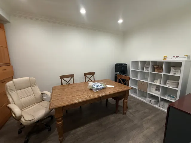 Recessed lighting, crown molding, and wood-finish flooring
