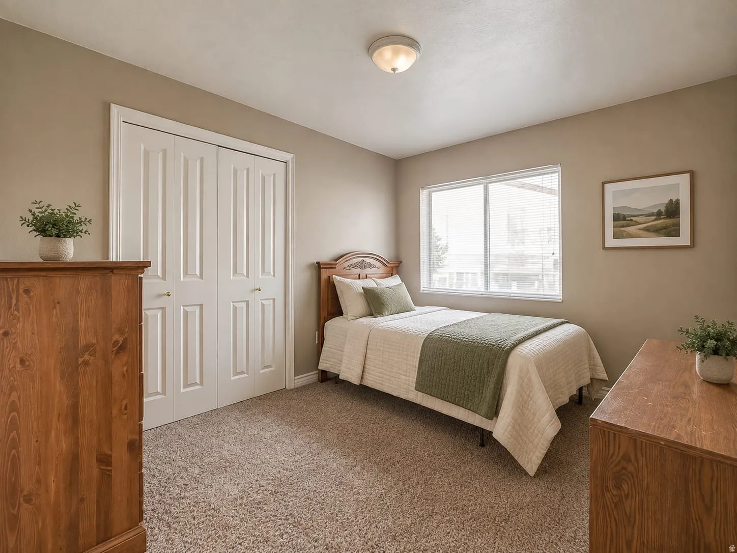 Neutral-toned walls complement the carpeted flooring