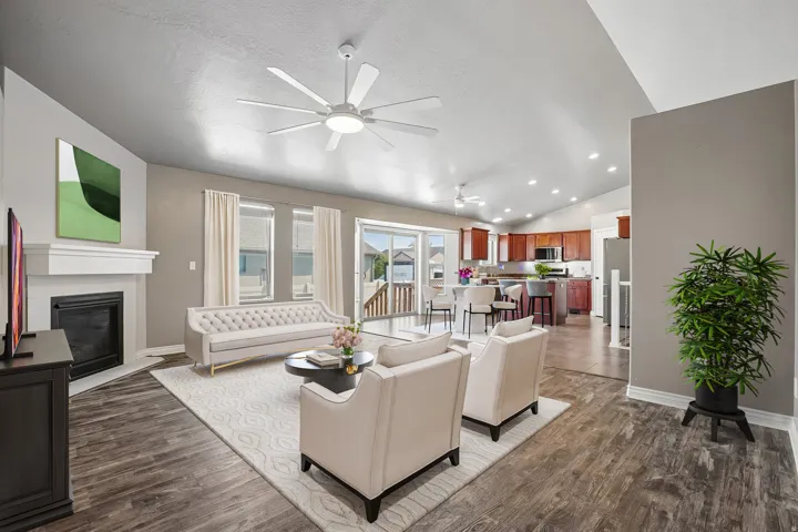 Vaulted ceiling with recessed lighting and ceiling fans
