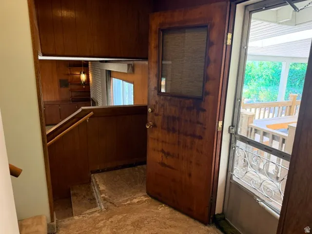 View from utility room to the family room AND the back yard deck.