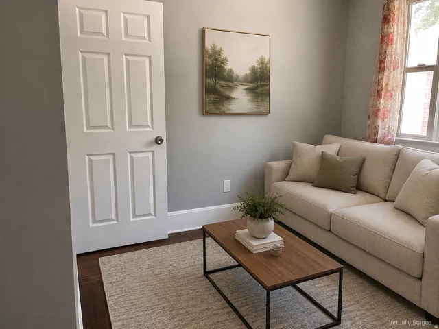 Hardwood flooring with baseboard trim, and a window with natural light