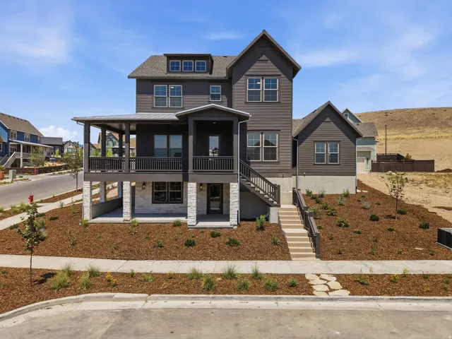 Multi-level exterior with dark horizontal siding