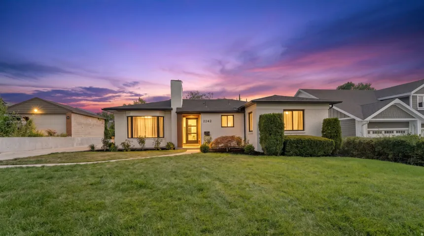 White brick exterior with black trim windows