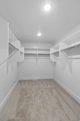 Spacious walk-in closet in the primary bedroom