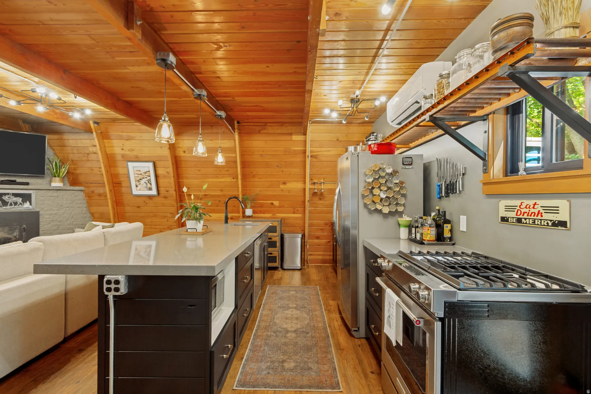 Island with sink, dishwasher and microwave