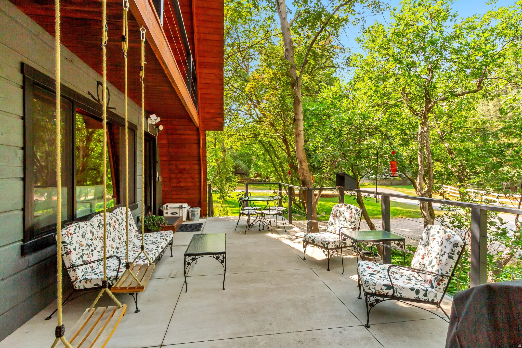 Large porch for relaxing and entertaining guests