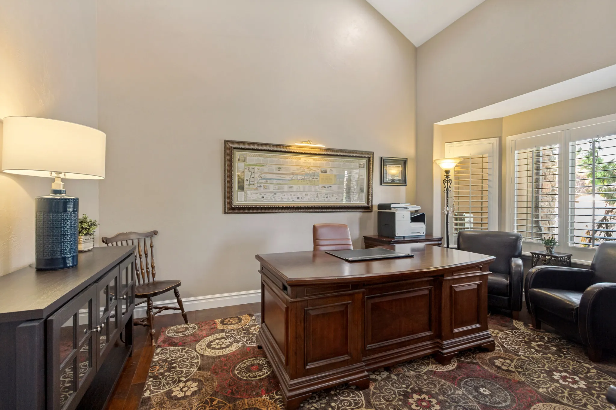 Vaulted ceiling, bay window, plantation shutters, wood-finish flooring, recessed lighting