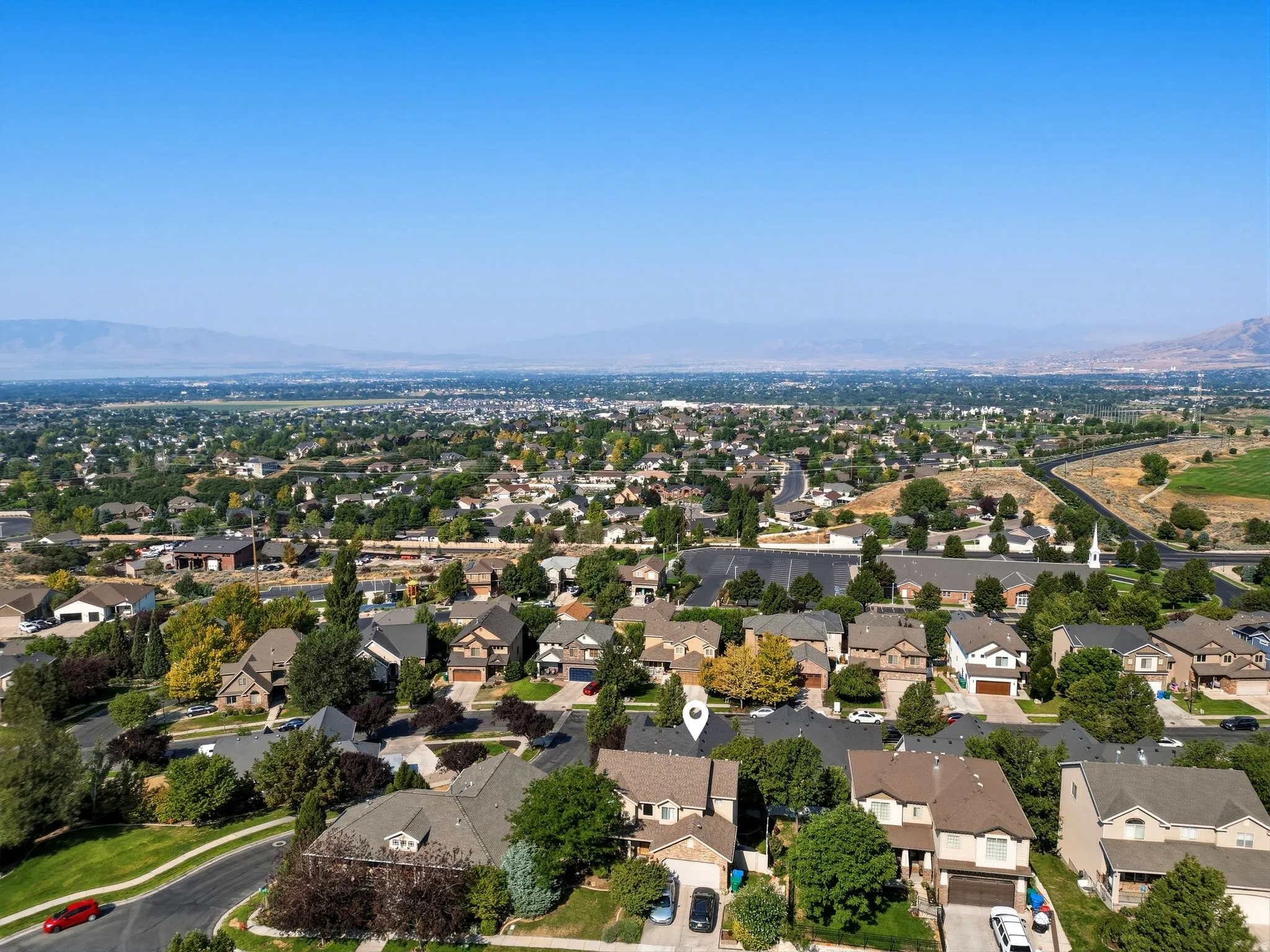 Expansive neighborhood setting with established homes and mature trees