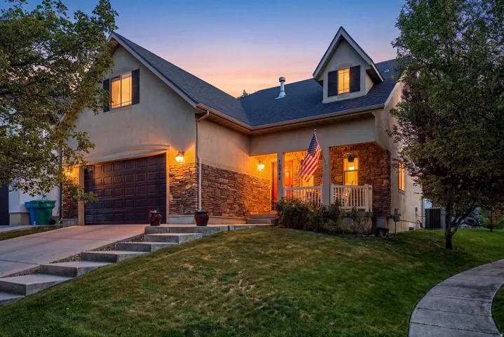Stucco exterior with stone accent siding