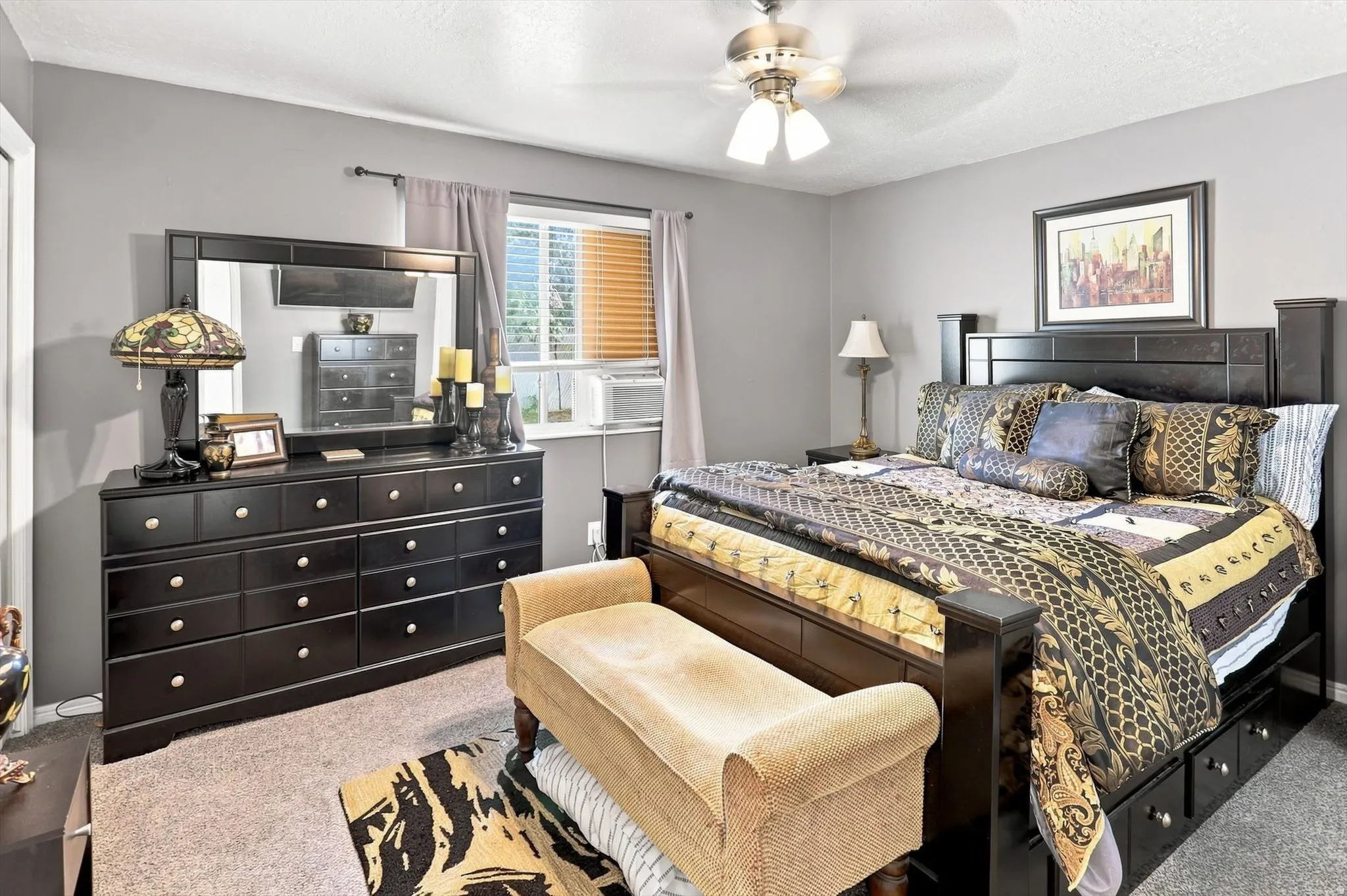Neutral-toned walls complement plush carpeting