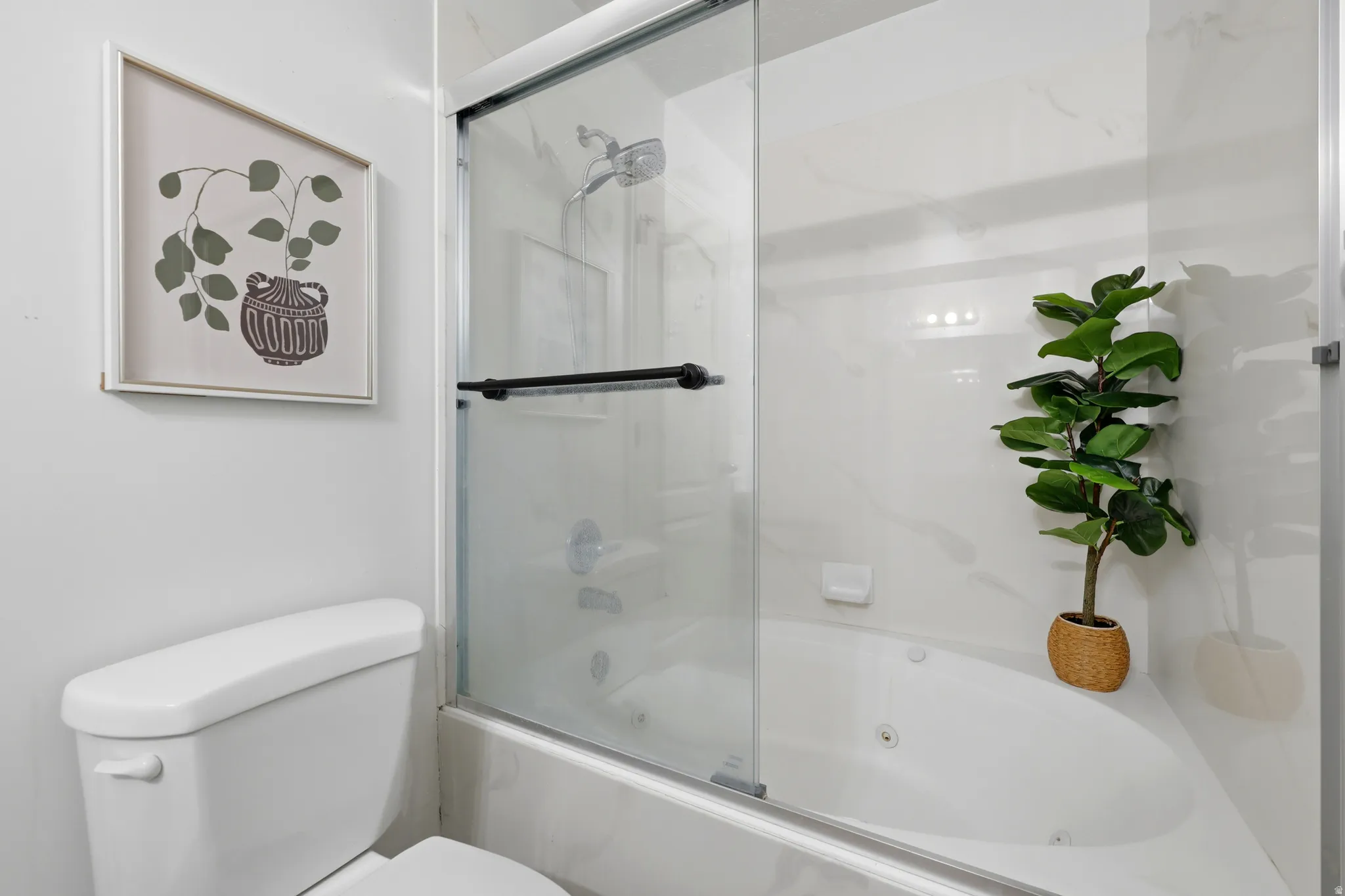 White tile surround with integrated lighting and soaking tub
