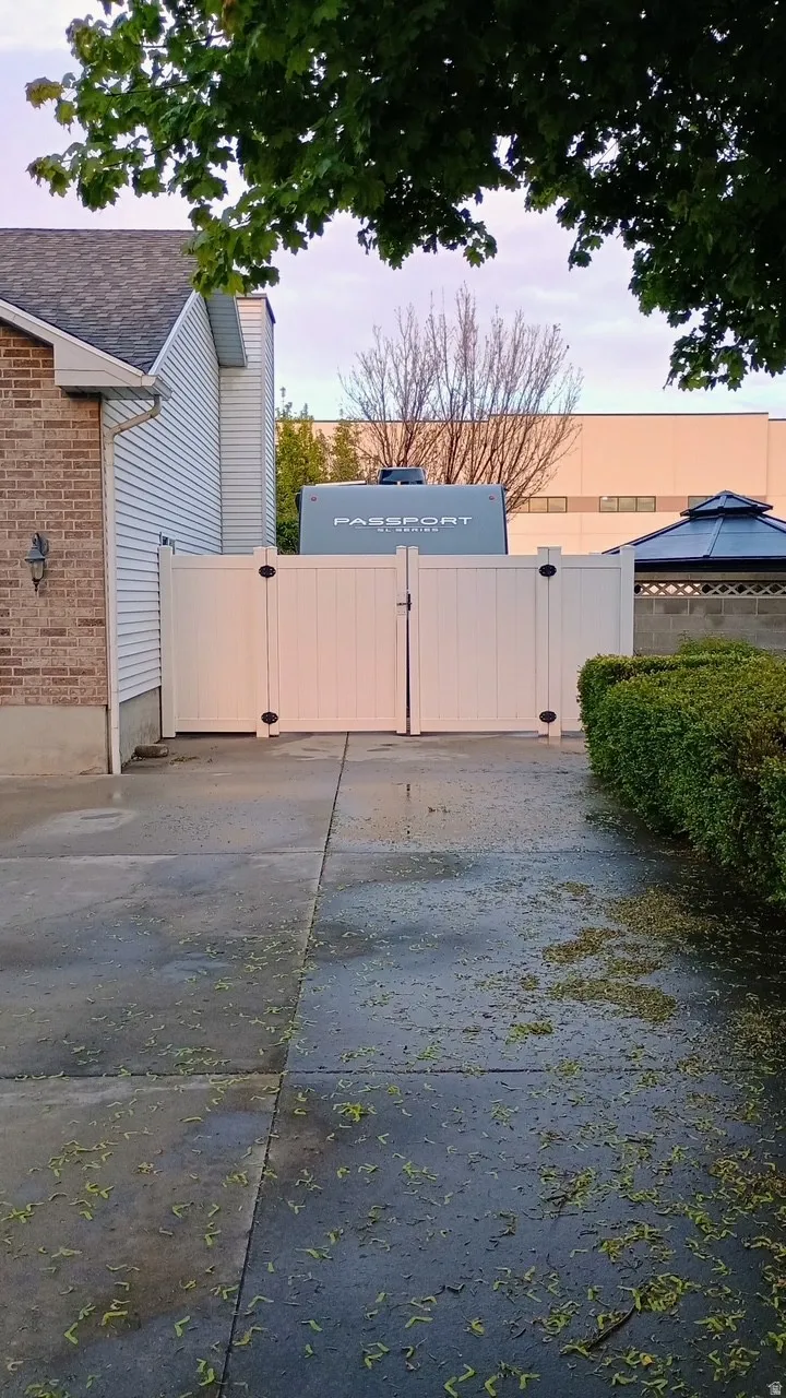 White privacy fence with double gates