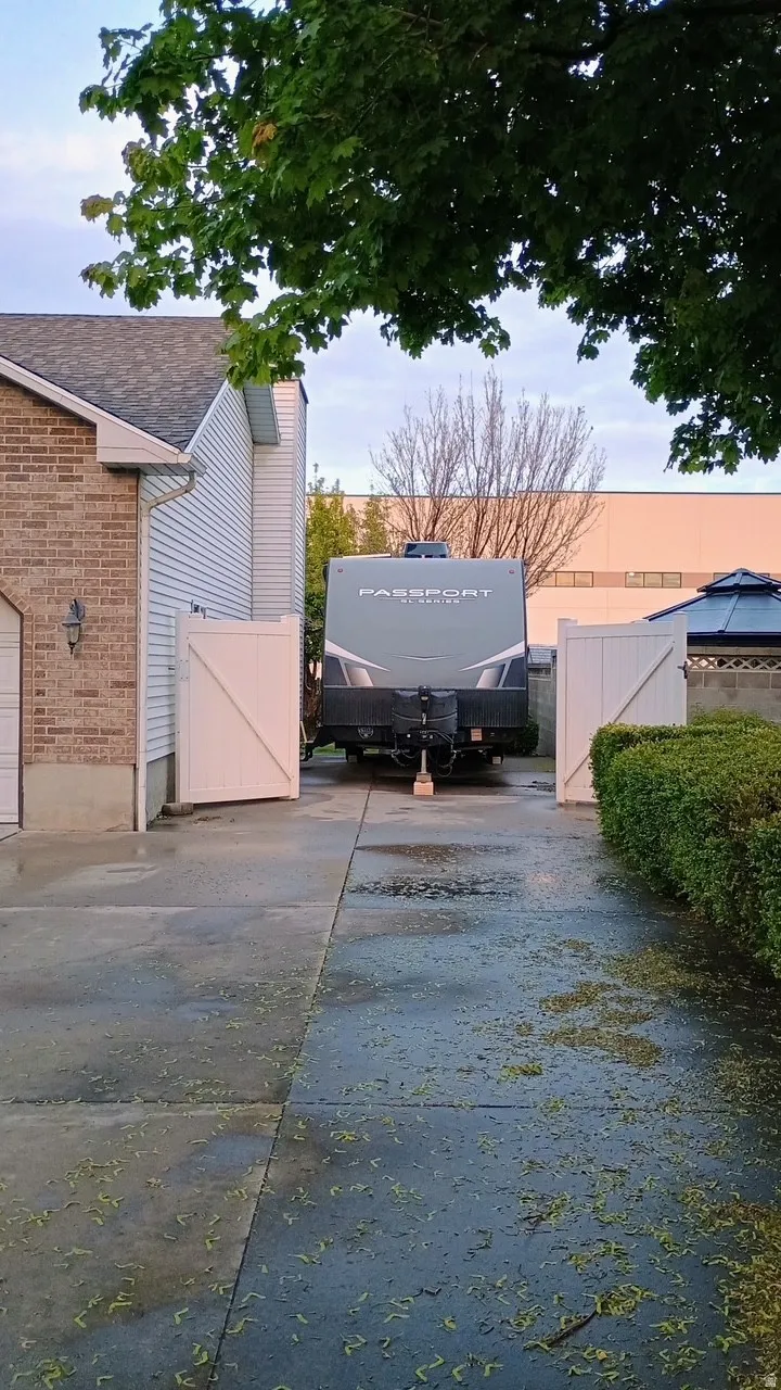 Concrete driveway with dual privacy gates