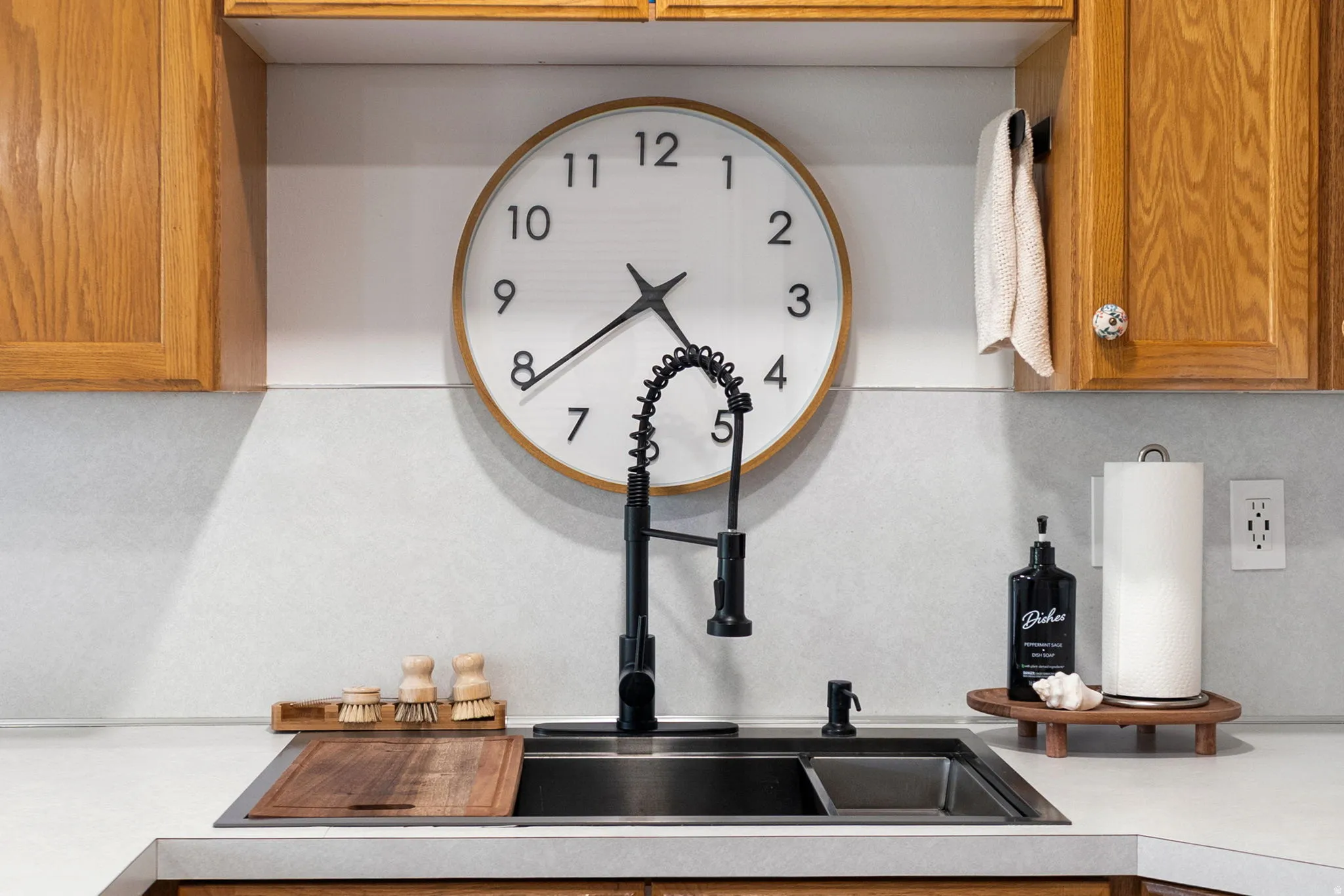 Beautifully updated with a "workstation sink" and new modern faucet.