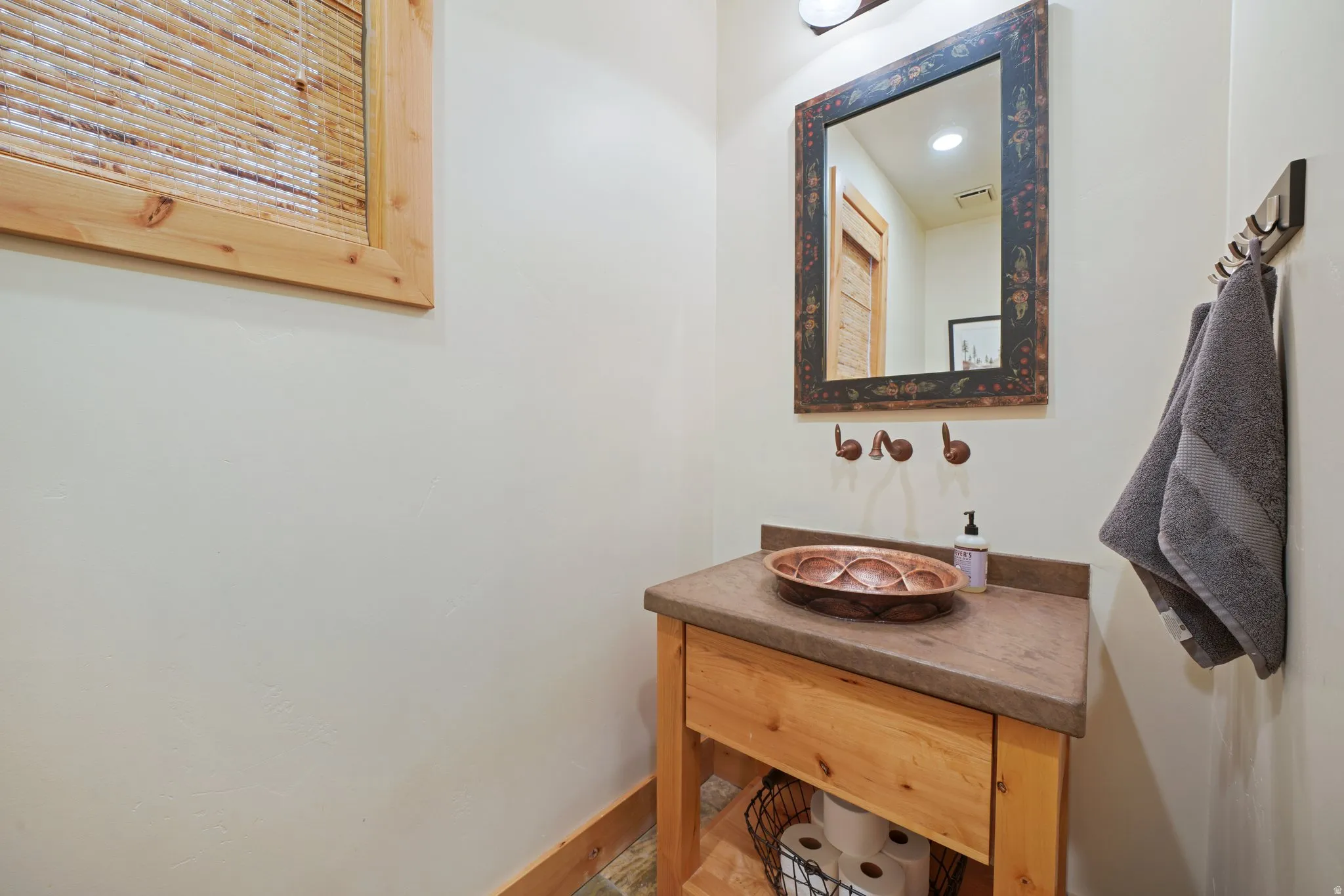 Wood-frame window with woven shade