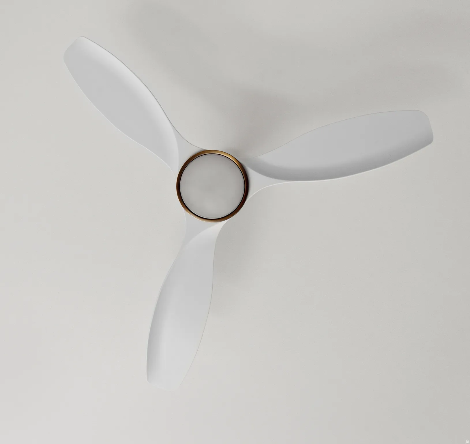 Three-blade ceiling fan with white blades and a brass-finish accent ring