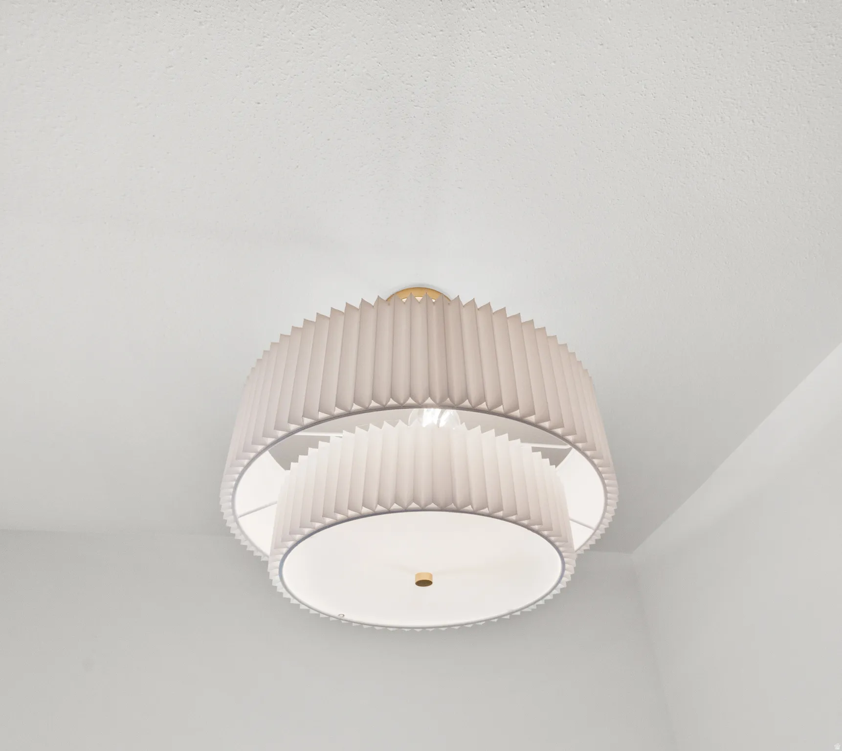 Tiered pleated fabric flush mount lighting with brass accents