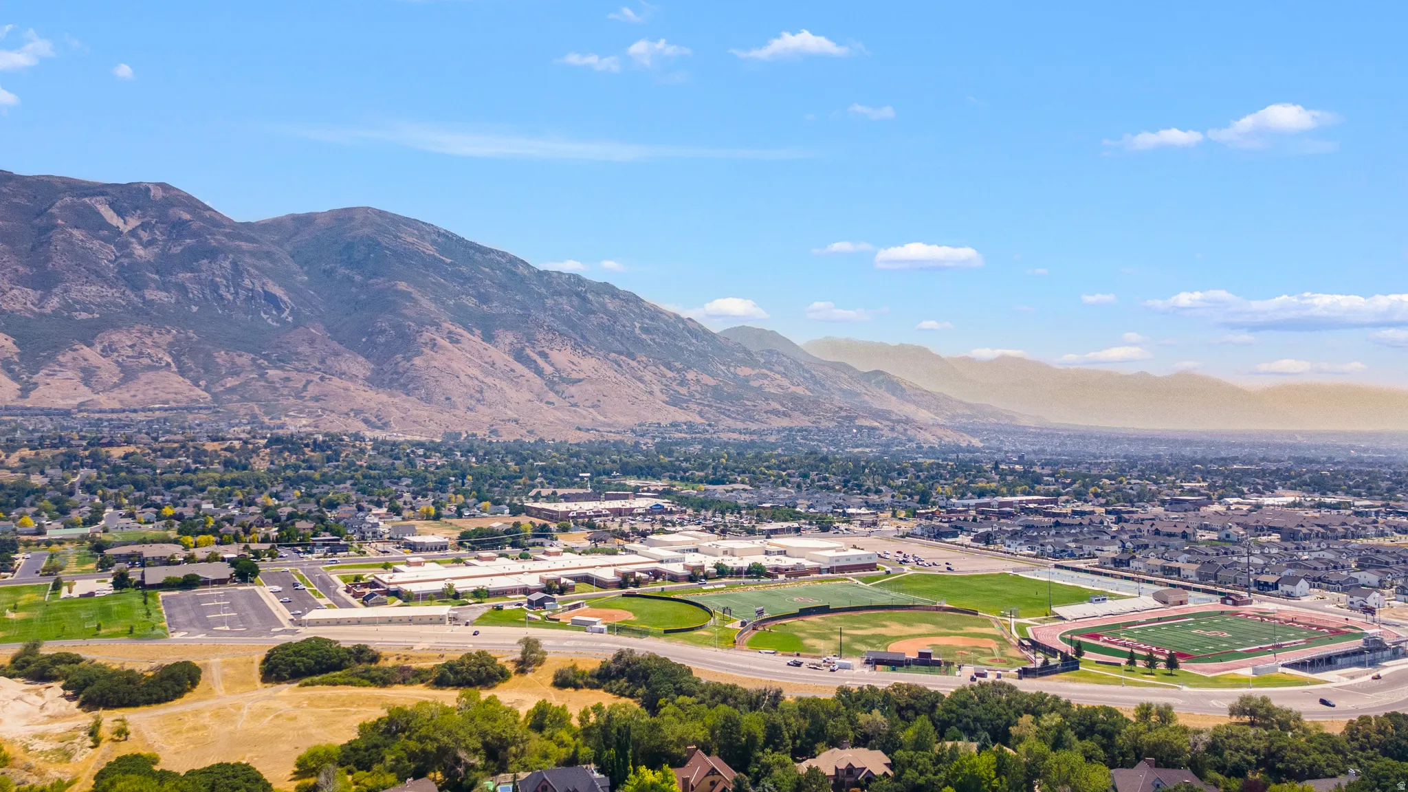 Mountain backdrop with expansive urban and suburban areas