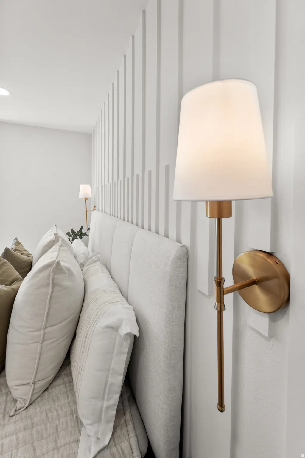 Accent wall featuring vertical paneling