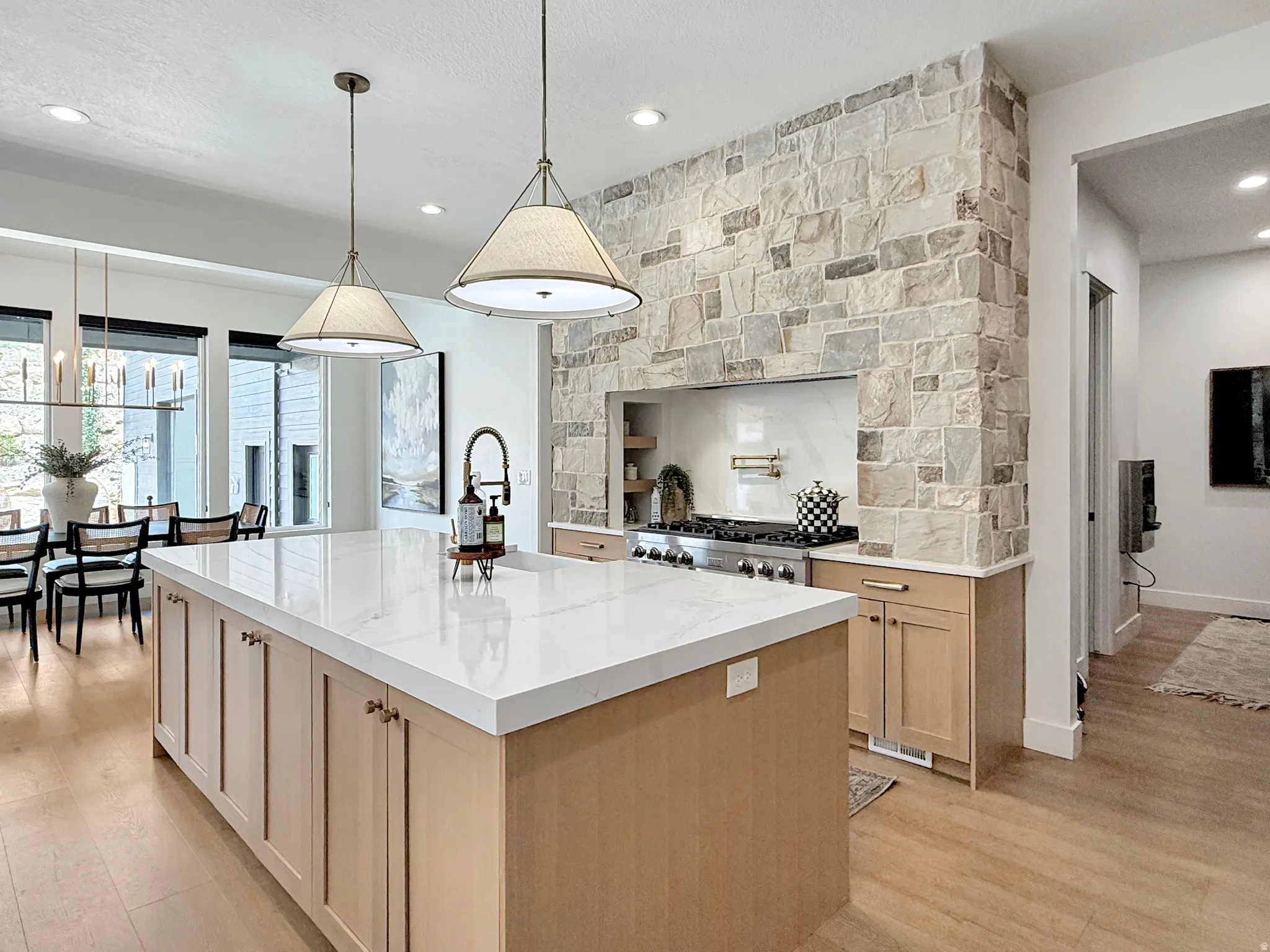 Central kitchen island with a white countertop