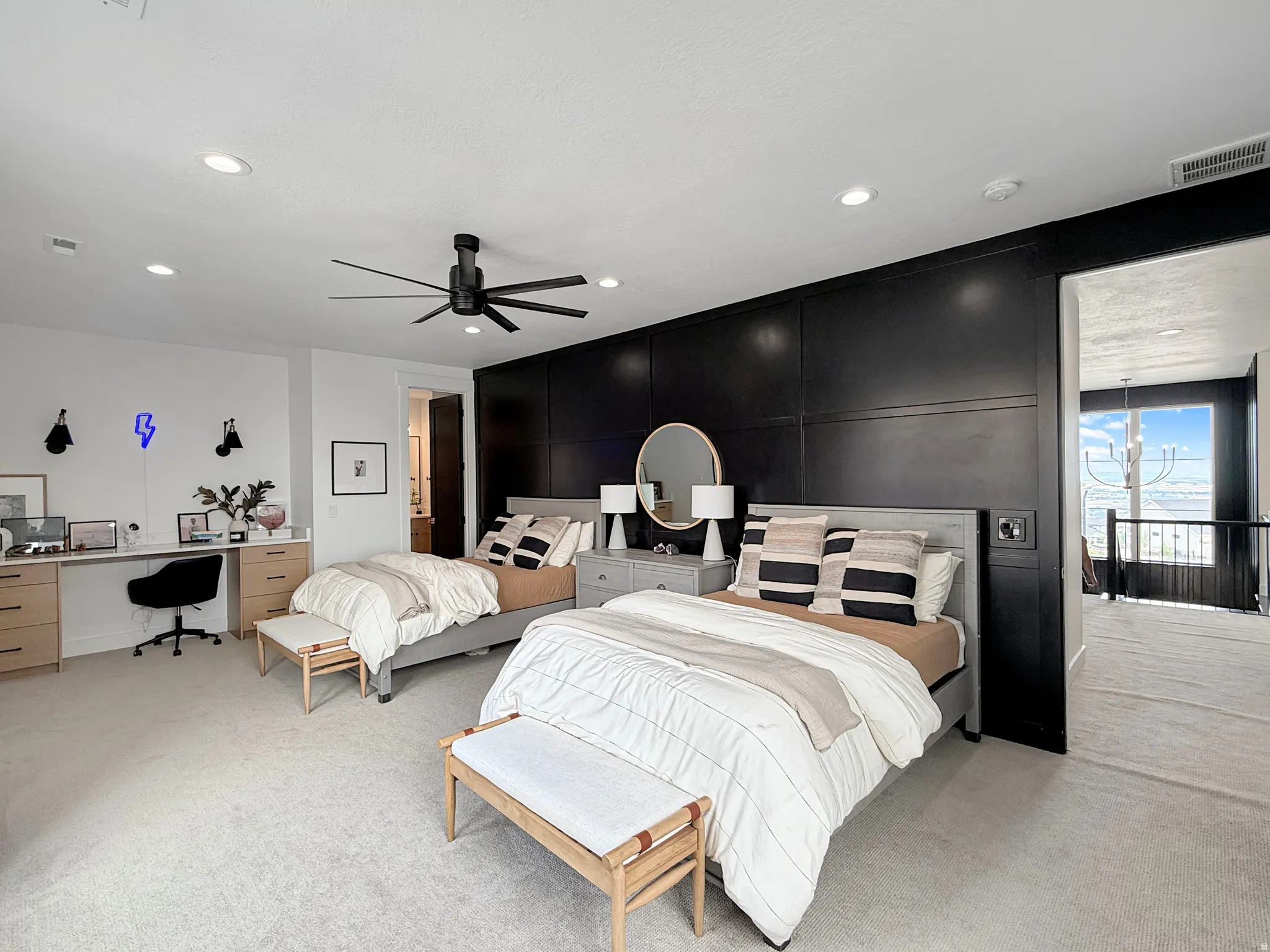 Recessed lighting, ceiling fan, built-in desk with wood-finish cabinetry, and wainscoting paneling