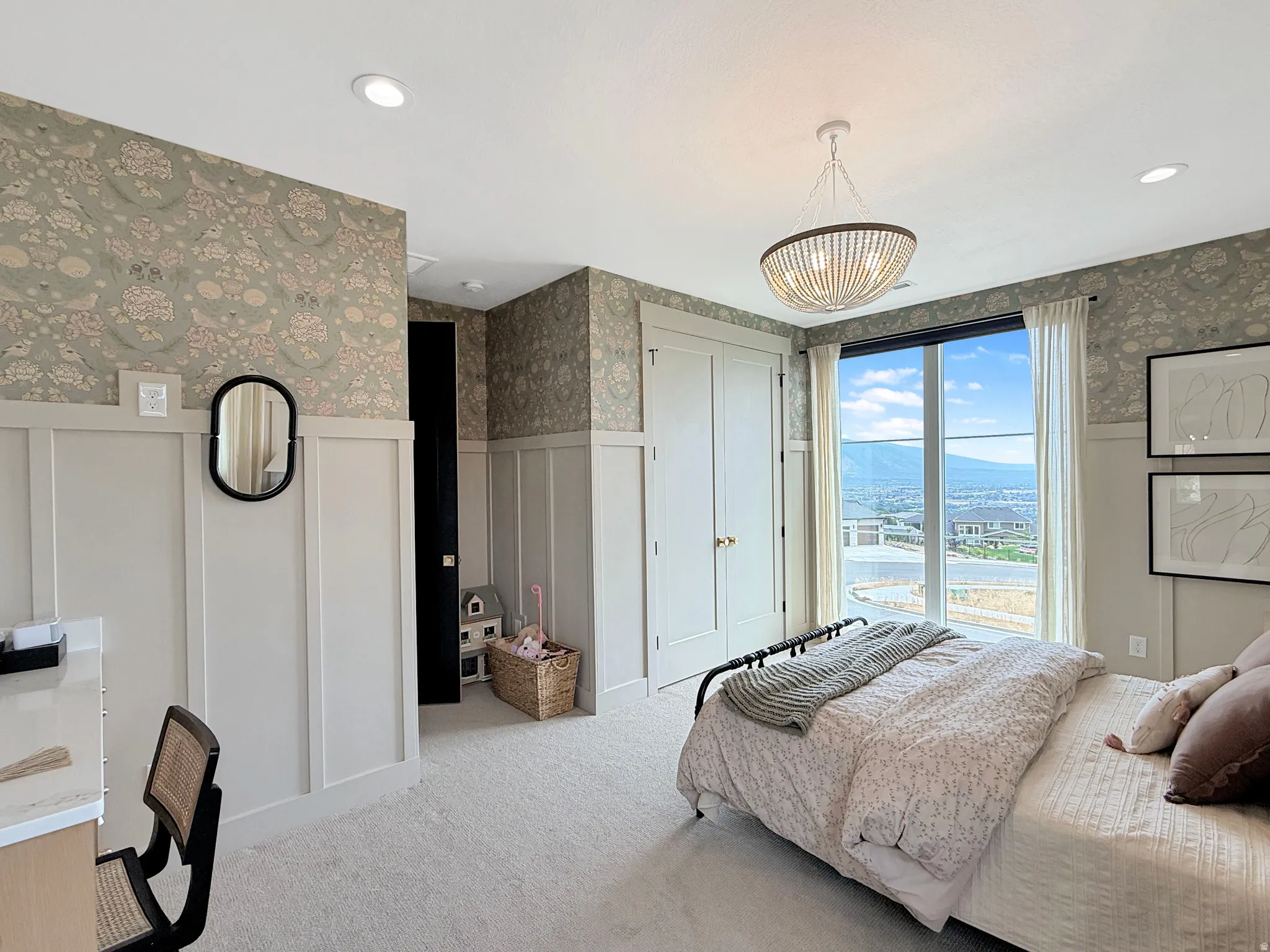 Board and batten wall paneling with decorative wallpaper, recessed lighting, and a drum pendant light fixture
